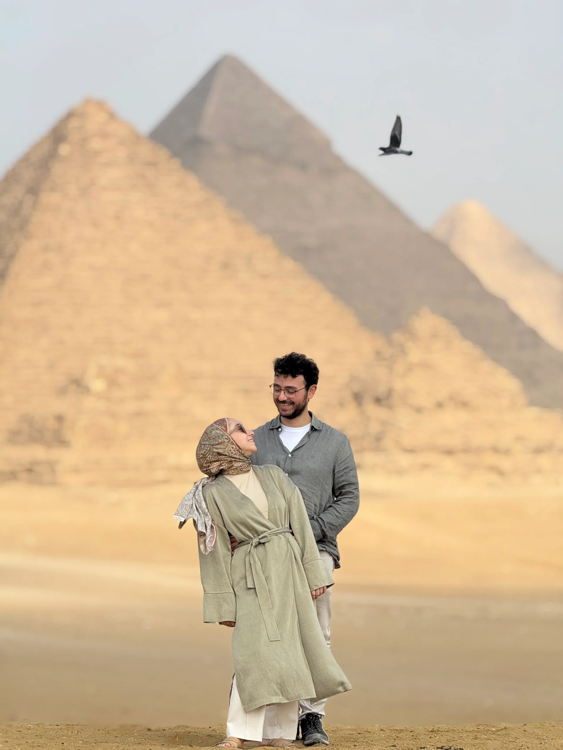Couple posing at the Giza Pyramids panoramic viewpoint during a private photoshoot