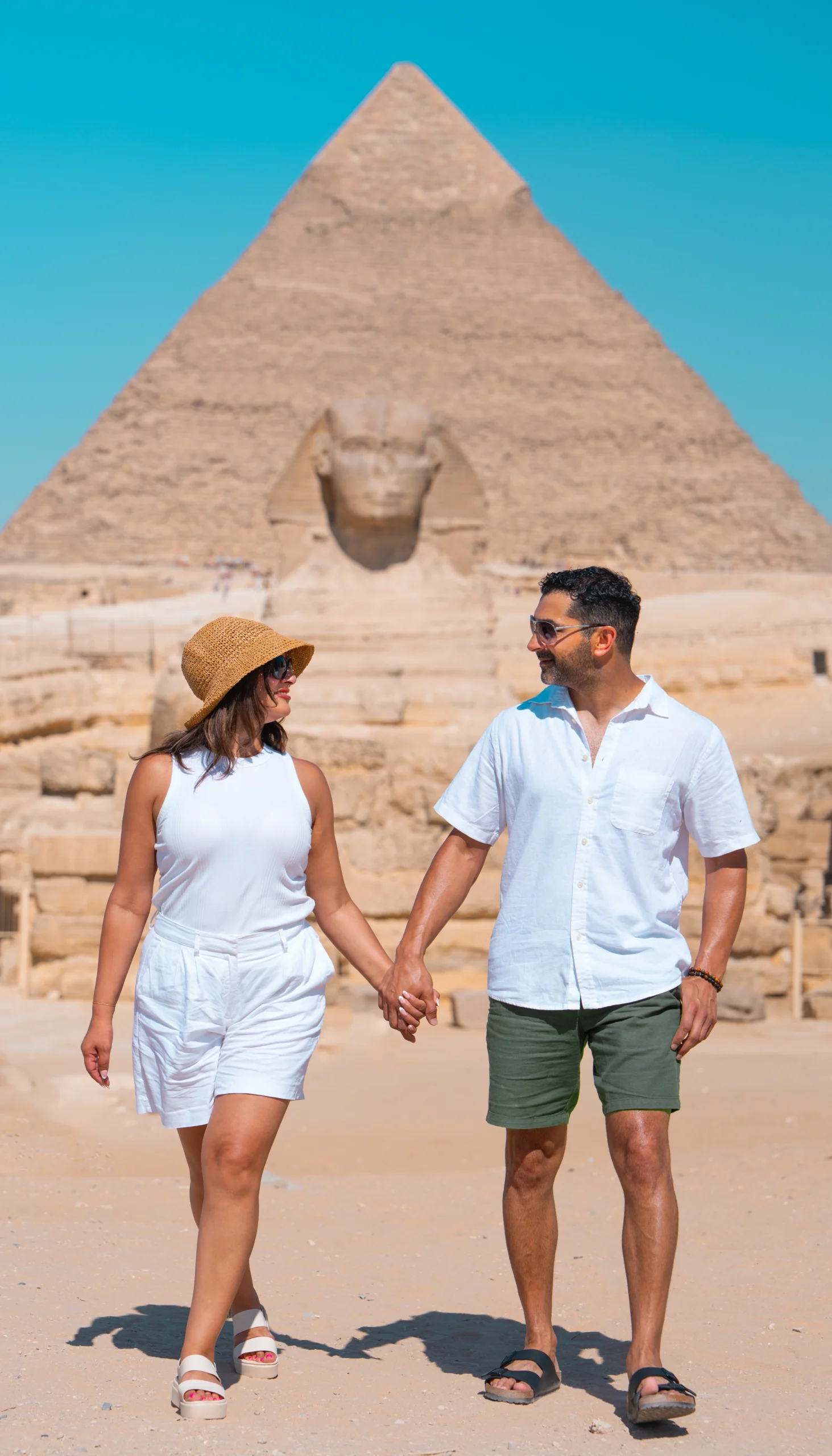 Couple posing at the Giza Pyramids panoramic viewpoint during a private photoshoot