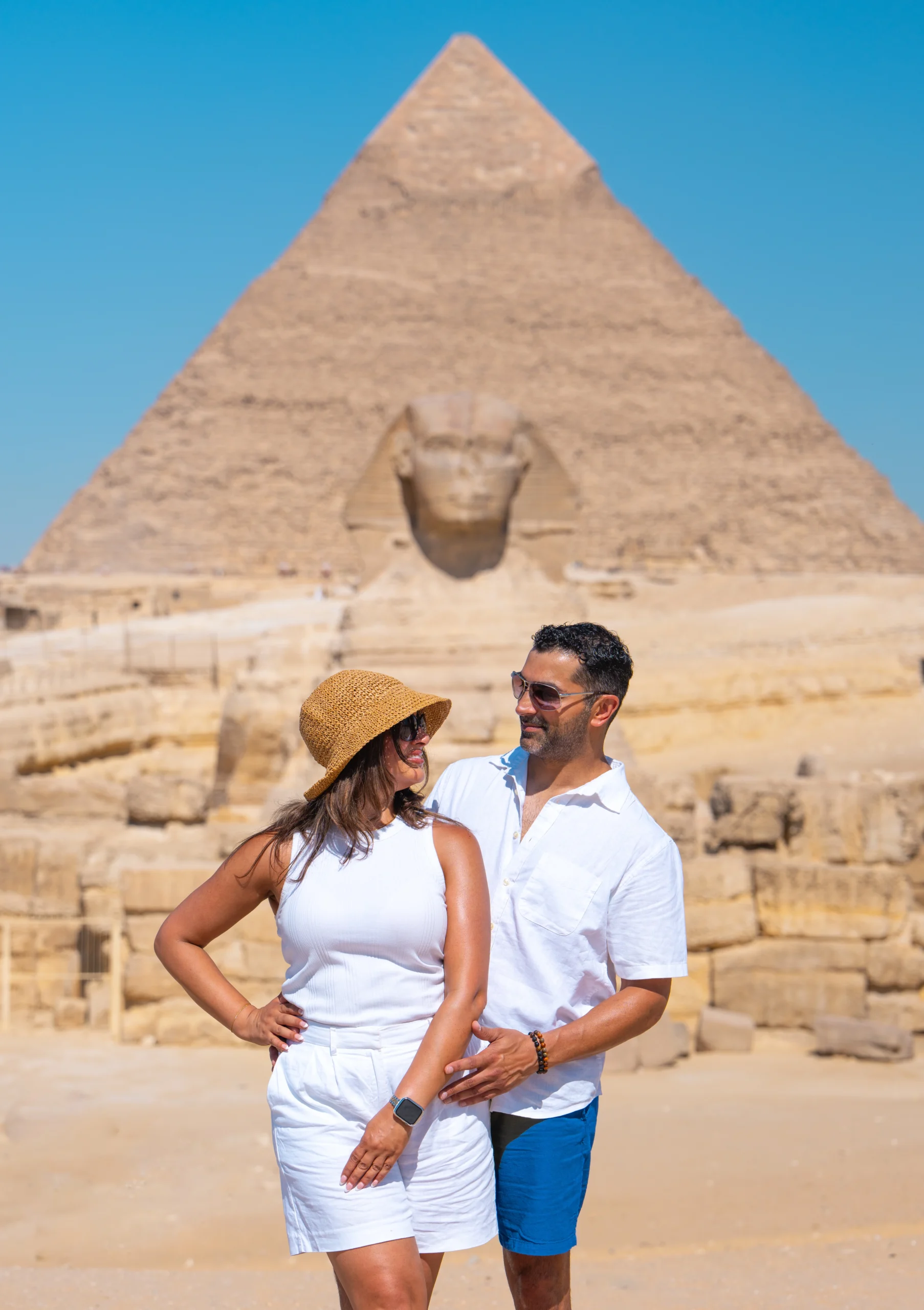 Couple posing at the Giza Pyramids panoramic viewpoint during a private photoshoot