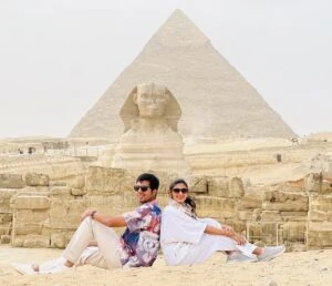 Couple posing at the Giza Pyramids panoramic viewpoint during a private photoshoot