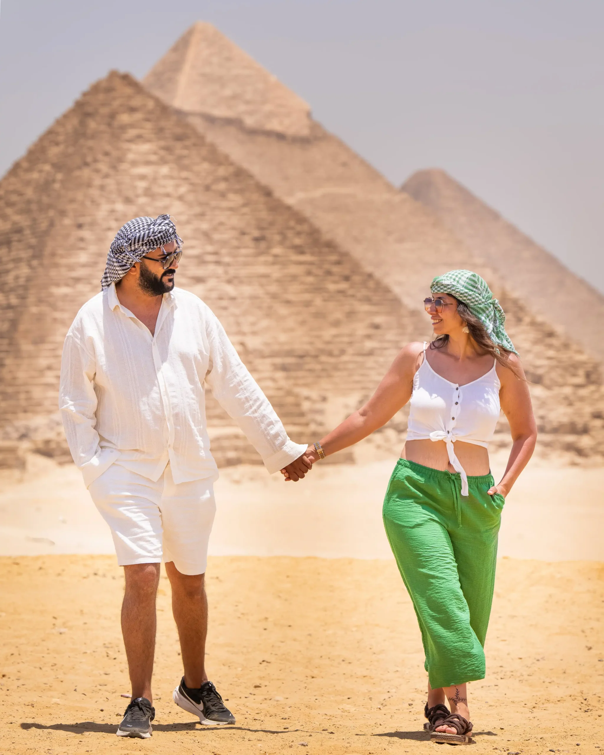 Couple posing at the Giza Pyramids panoramic viewpoint during a private photoshoot