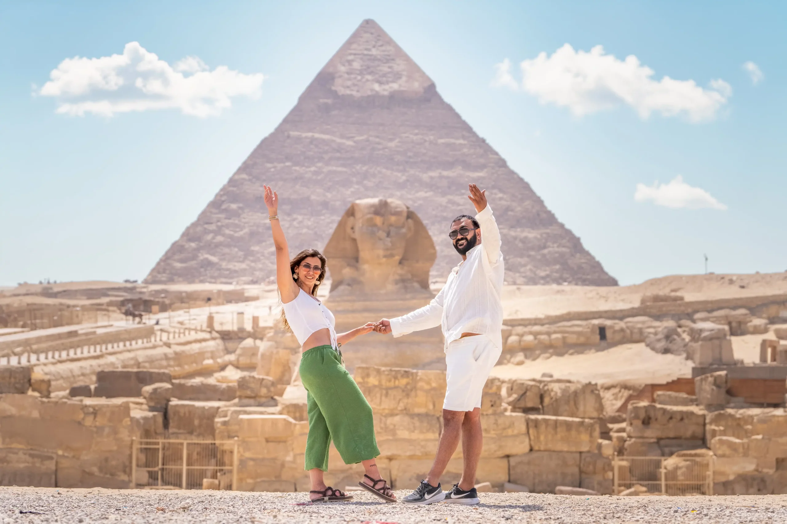 Couple posing at the Giza Pyramids panoramic viewpoint during a private photoshoot